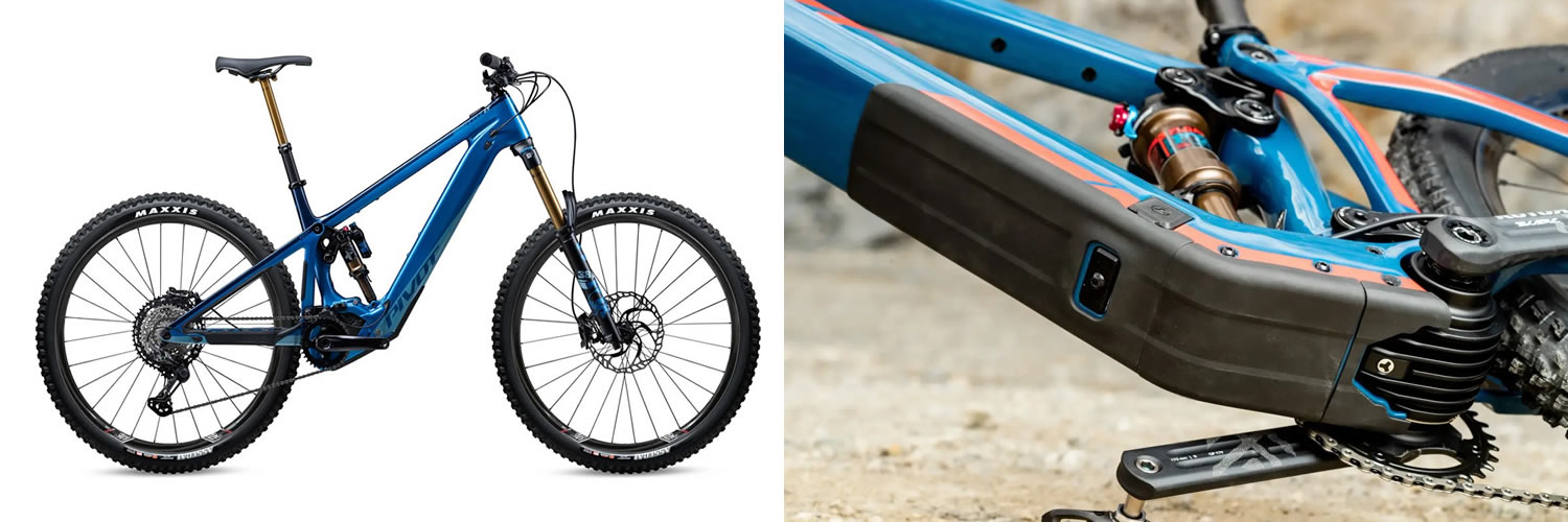 The Pivot Shuttle SL Team XTR carving precise lines through technical rock gardens, its Shimano XTR components shining in the golden hour light.